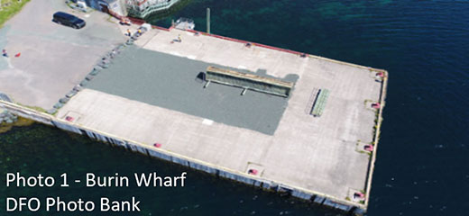 The photo depicts the wharf in the town of Burin which was found to have significant rot at the base of the structure.
